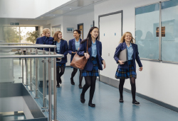 Girls in school corridor